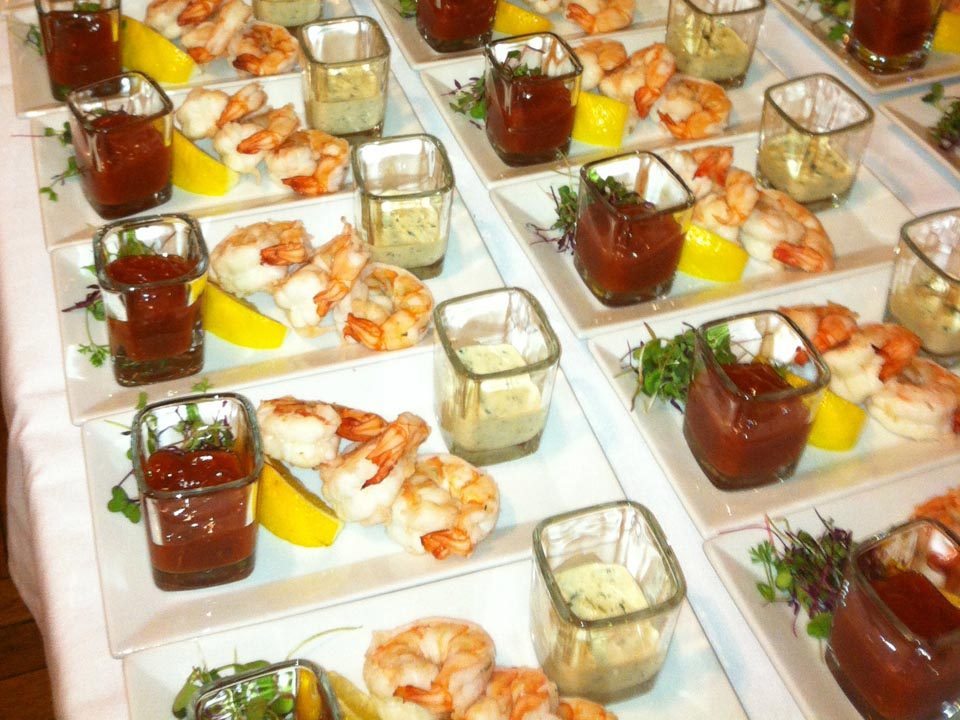 Shrimp cocktail service, arranged in rows